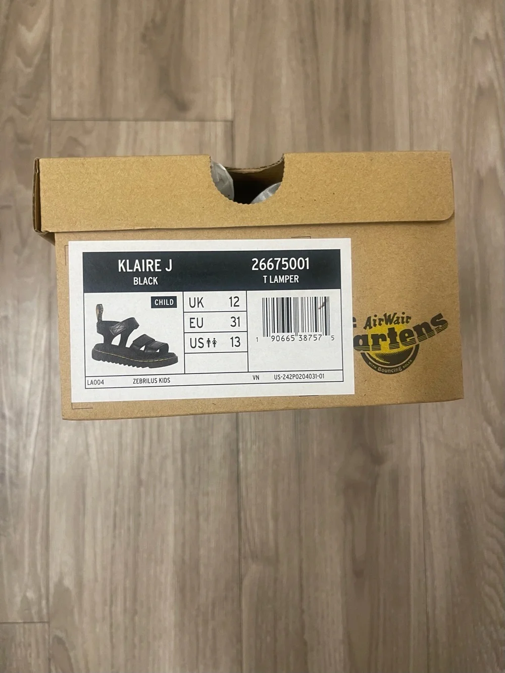 Dr. Martens Kids Black Sandals with Yellow Stitching
